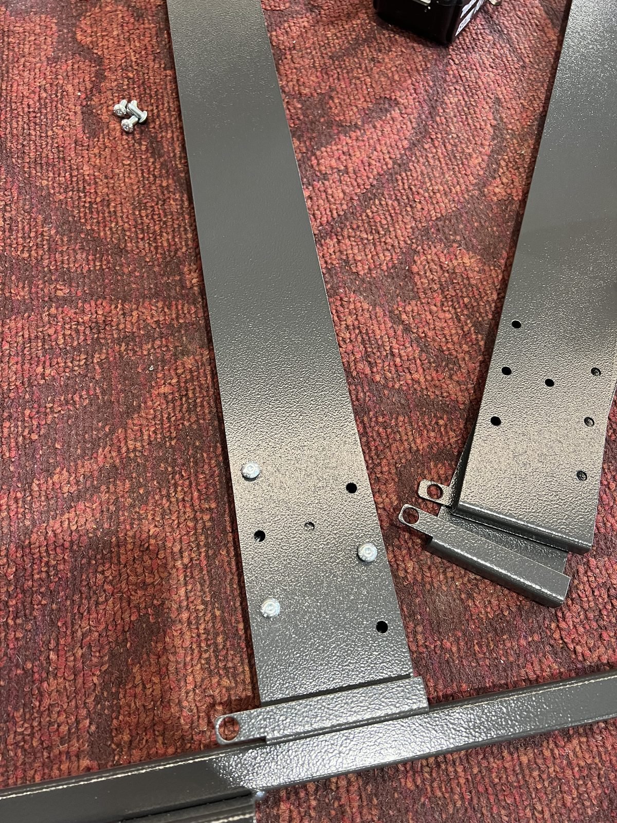 Powder-coated brackets with rivet fasteners
